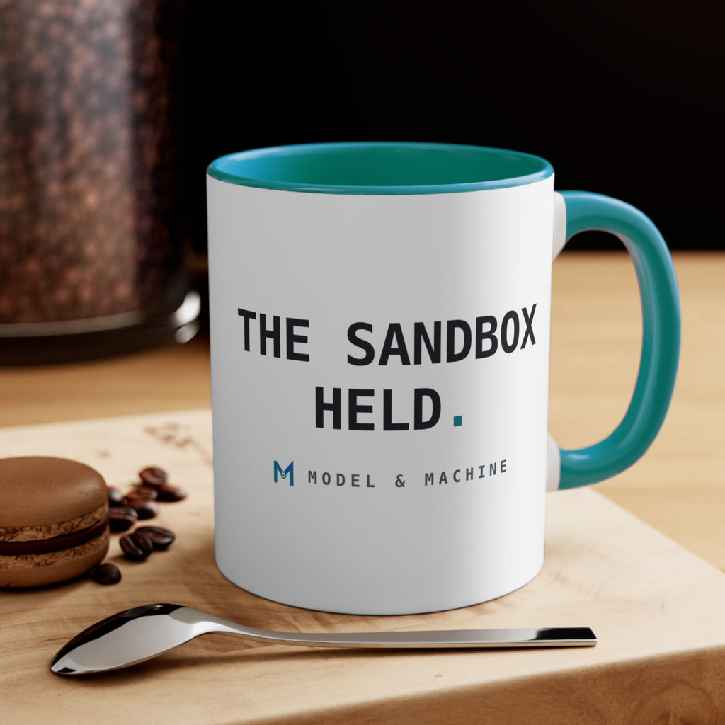 THE SANDBOX HELD. — Accent Mug